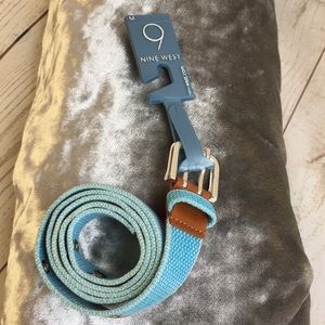 Blue cotton belt with metal grommets